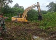 Melalui Babinsa Kodim Landak Dampingi Perluasan Lahan Pertanian Program Cetak Sawah