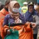 Di Tengah Kabut Asap, Ojol Pontianak Dapat Bantuan Sembako dan Air Bersih